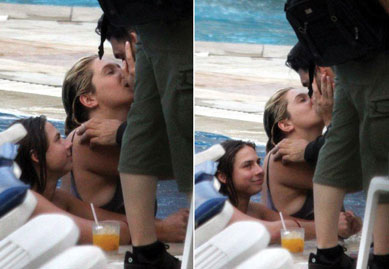 Ke$ha  fotografada beijando rapaz e amiga na piscina de hotel 