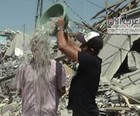 Morador de Gaza destruda cria desafio do balde de escombro