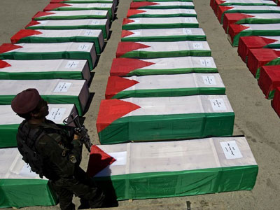 Israel devolve restos mortais de militantes  Autoridade Palestina