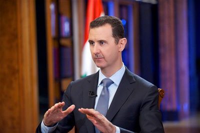 Bashar al-Assad diz que destruio de arsenal qumico demorar um ano