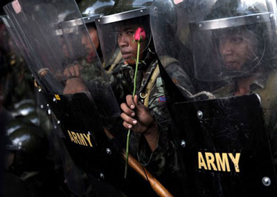 Protestos contra o premi da Tailndia matam um em Bangcoc