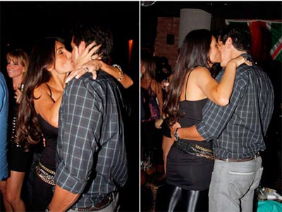 Mrcio Garcia e Andra Santa Rosa trocam beijos em evento