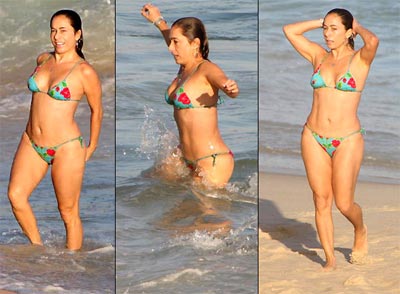 Cissa Guimares aproveita dia de sol na praia do Arpoador