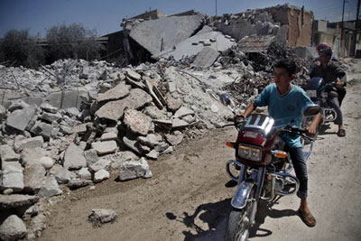 Rebeldes se retiram parcialmente de bastio na cidade sria de Aleppo