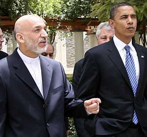 Obama celebra deciso de Karzai de aceitar segundo turno no Afeganisto