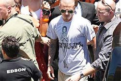 Beckham aparece usando camiseta com imagem da mulher
