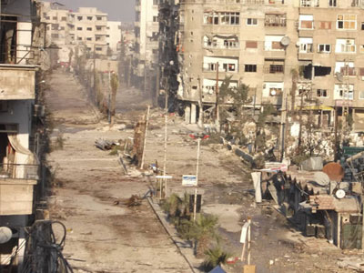 Foras de Assad pressionam para retomar subrbio de Damasco 