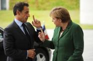 Sarkozy e Merkel pressionam Itlia e Espanha 