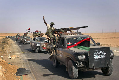 Foras rebeldes avanam sobre ltimos redutos pr-Kadhafi