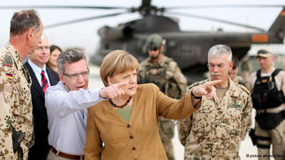 Em visita ao Afeganisto, Merkel acusa lentido nas reformas do pas