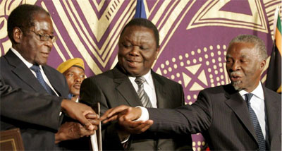 Rivais formalizam acordo para dividir poder no Zimbbue