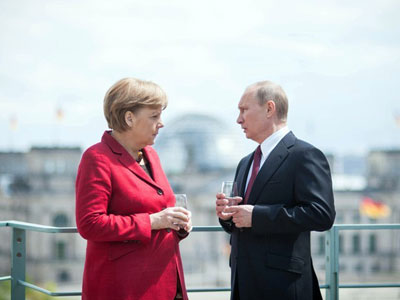 Putin e Merkel defendem 