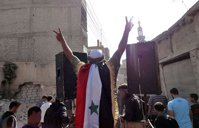 Tropas srias invadem casas na cidade de Hama, dizem morador